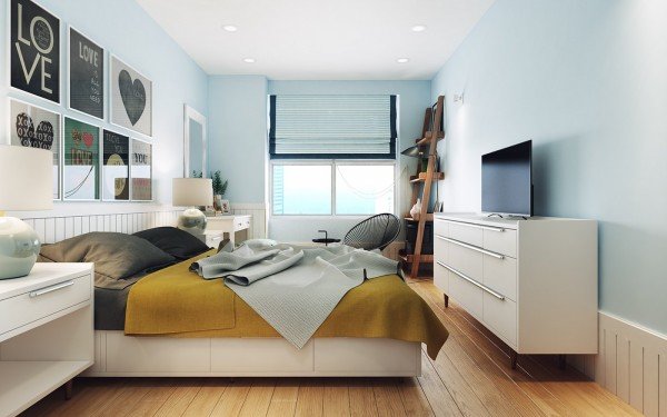 Scandi styled bedroom with layed bedding