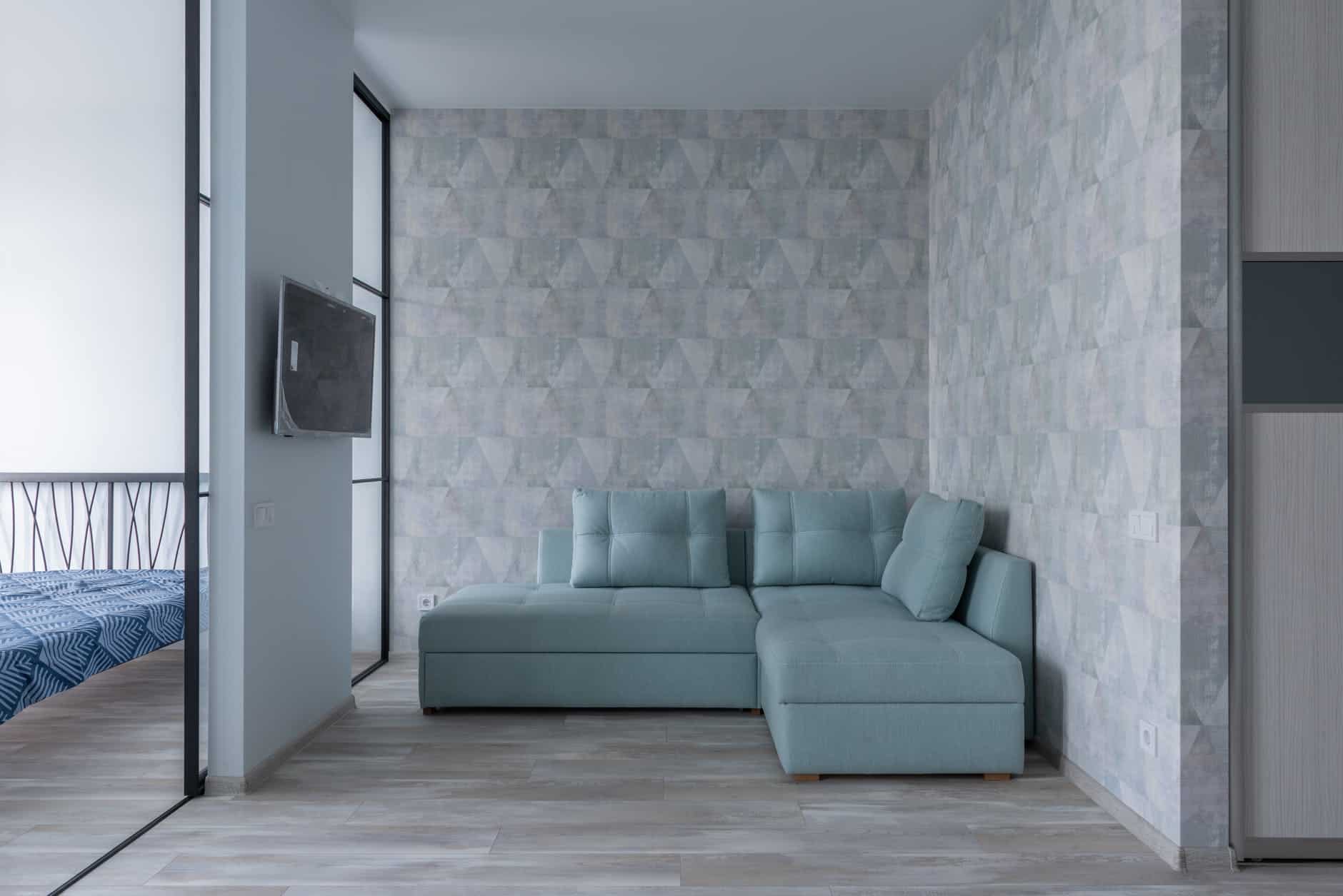 modern apartment with couch and bed