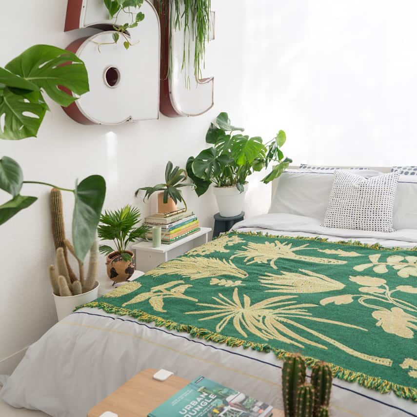 Indoor gardening ideas - Add A Lush Planter To The End Of Your Bed